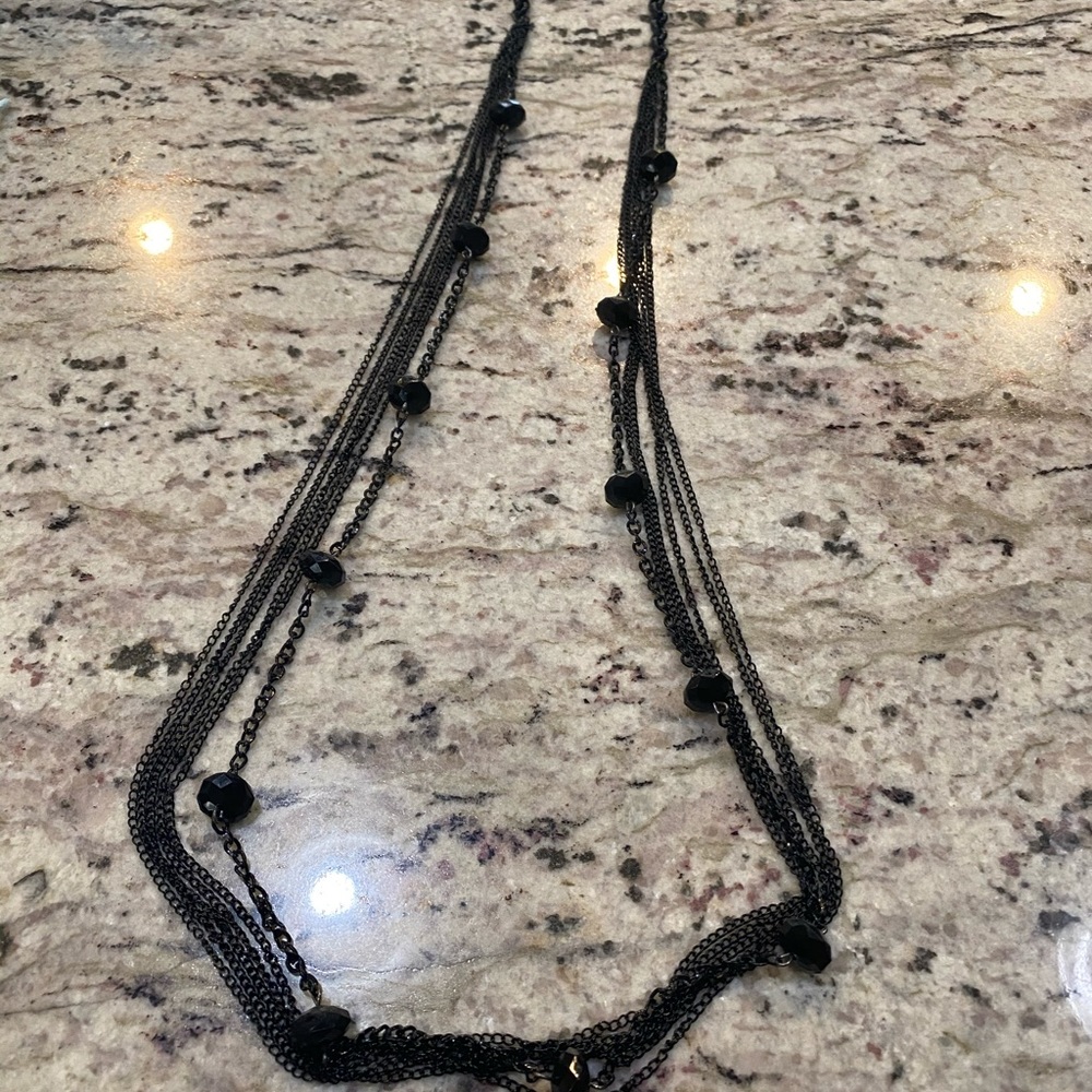 Long black beaded necklace